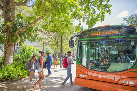 students boarding the Hurry 'Canes Shuttle